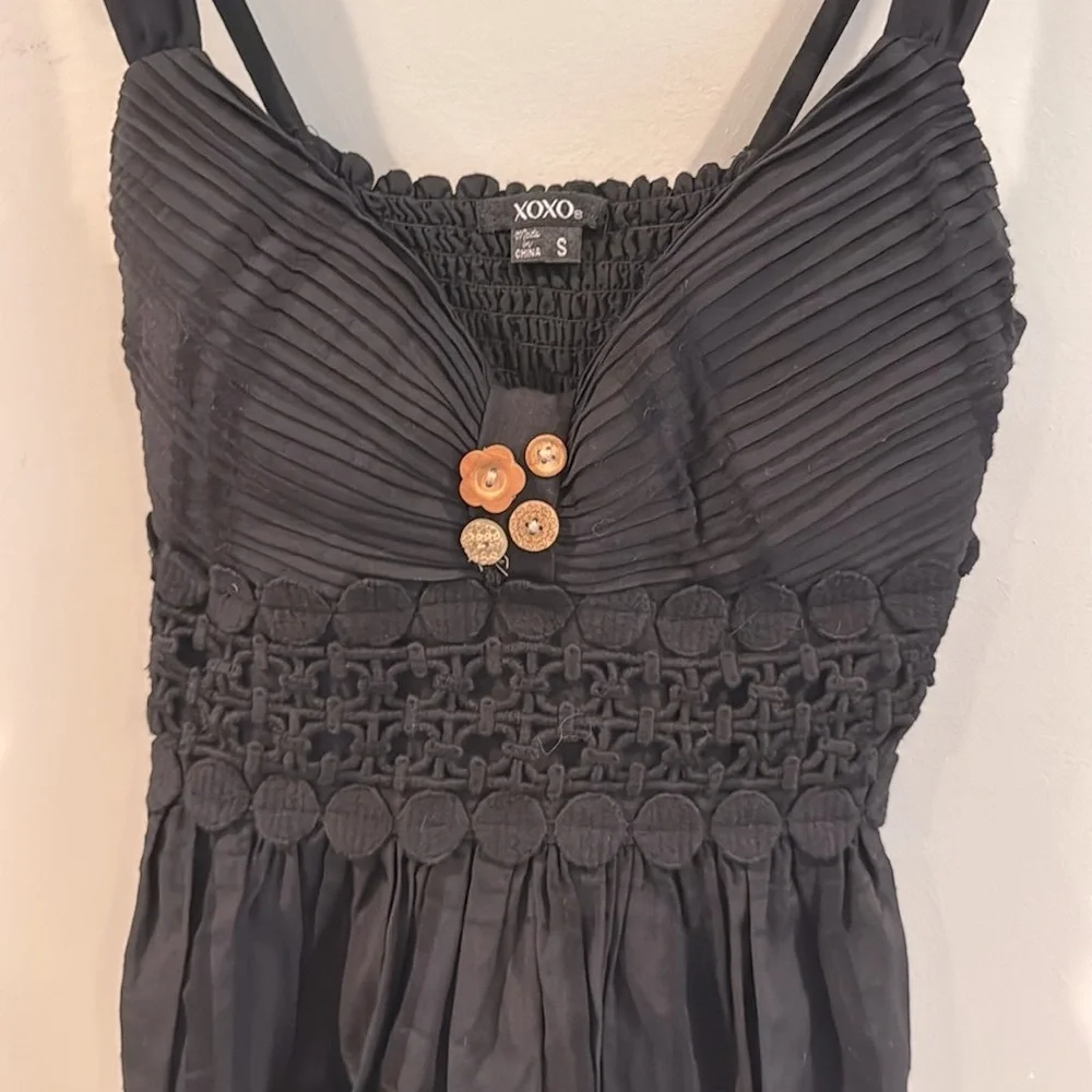 XOXO | Black Sleeveless Top w/ Lace, Bow & Wood Flower Button Detail - Picture 2 of 12